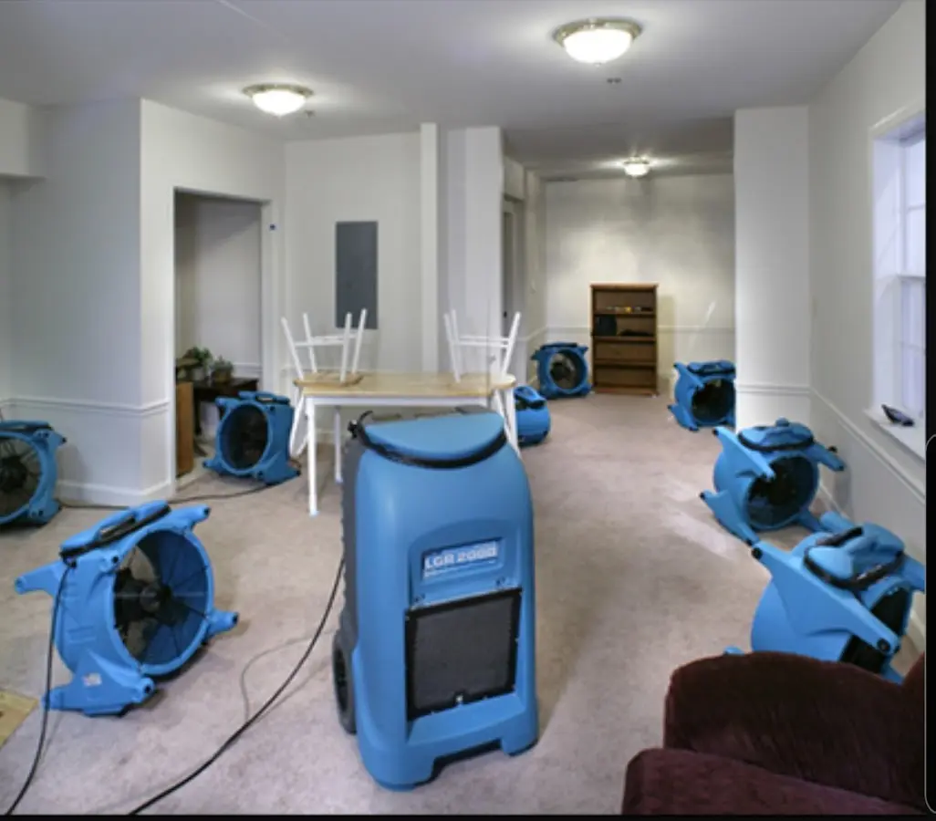 Air movers and dehumidifier setup for Water Extraction & Removal in Russellville